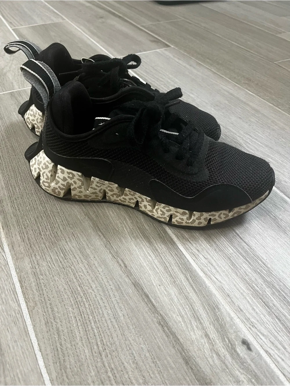 Reebok Black Athletic Sneakers with Cream Leopard-Pattern Sole